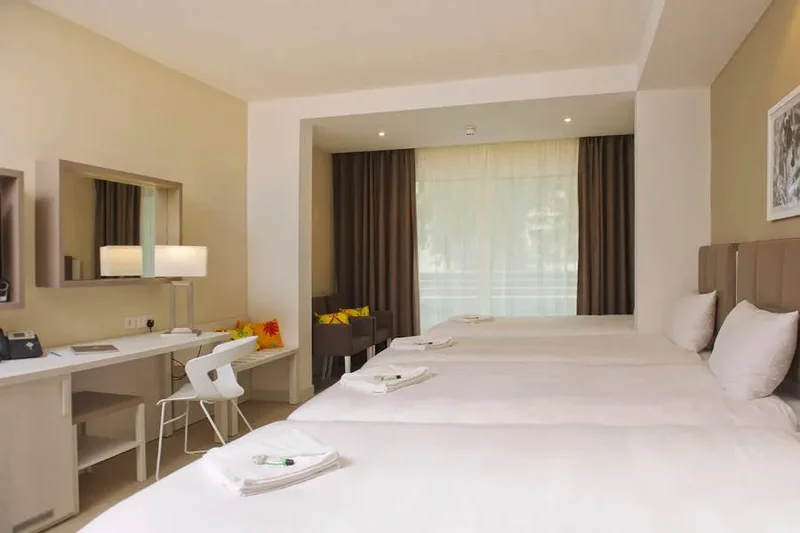 chambre quadruple au Salini Resort Hotel